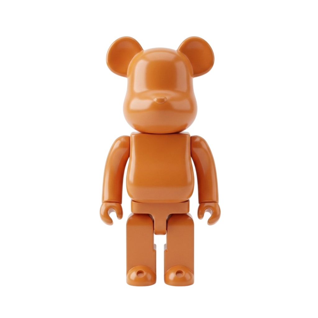 An orange bear-shaped collectible figure with rounded blocky arms and legs, standing against a plain white background.