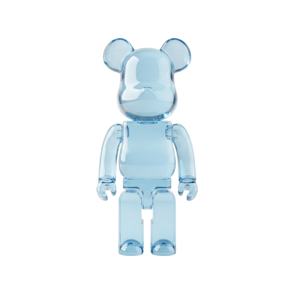 A translucent light blue bear-shaped collectible figure with rounded ears, block arms, and block legs, shown against a plain white background.