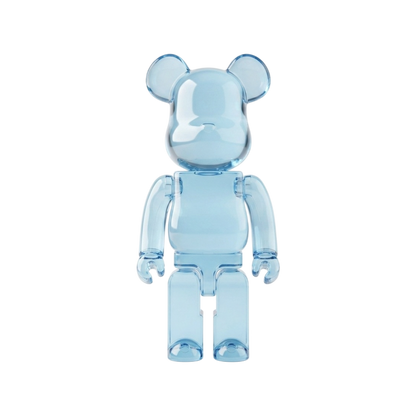 A translucent light blue bear-shaped collectible figure with rounded ears, block arms, and block legs, shown against a plain white background.