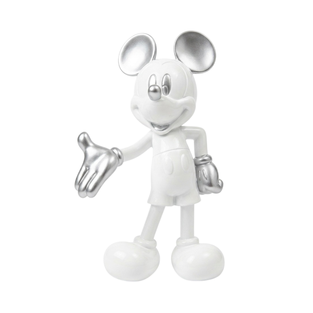 A Mickey Mouse figurine in a metallic silver finish, standing on a plain white background with one hand extended outward.