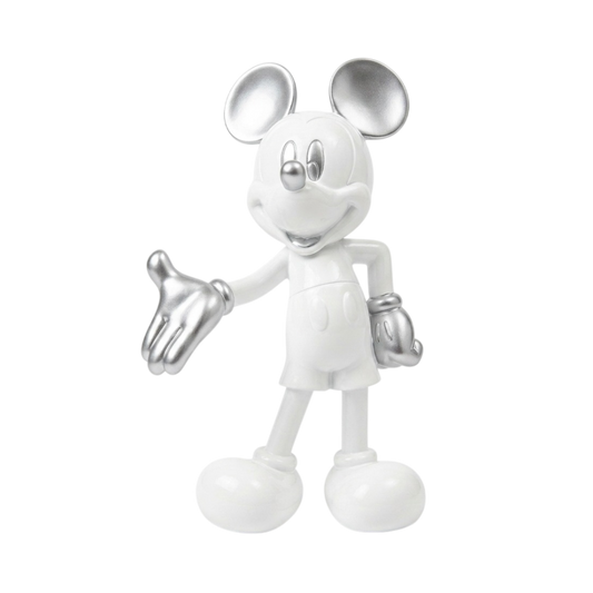 A Mickey Mouse figurine in a metallic silver finish, standing on a plain white background with one hand extended outward.