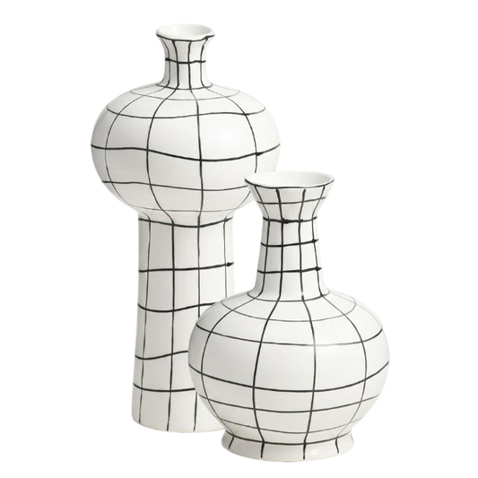 Two white ceramic vases with a black grid pattern, one tall and one short, on a plain white background.