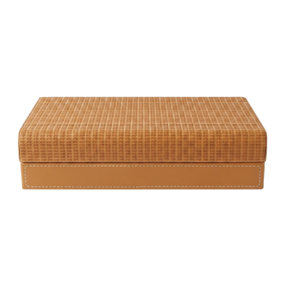 A rectangular tan leather and woven straw box with a stitched seam on the front, shown against a plain white background.