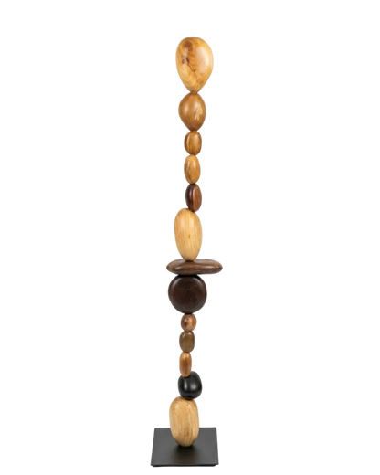Decorative tower of wooden beads on a white background