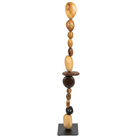 Decorative tower of wooden beads on a white background