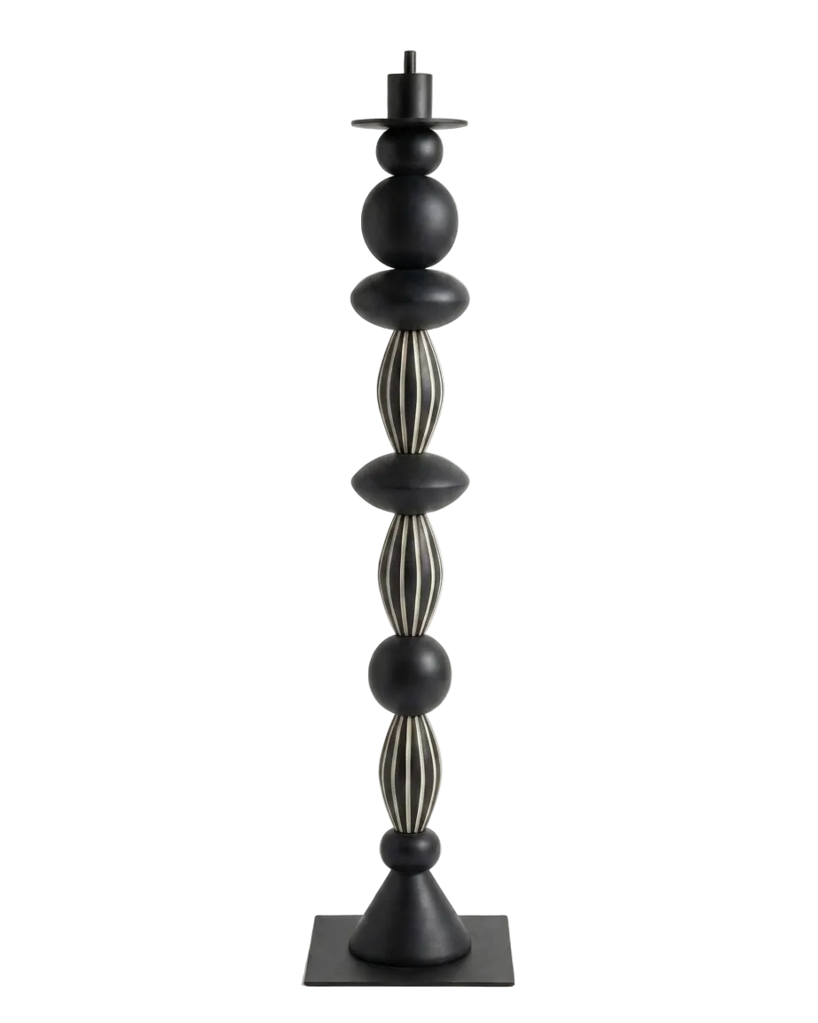 Black decorative candle holder with spherical and cylindrical design on a white background
