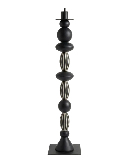 Black decorative candle holder with spherical and cylindrical design on a white background