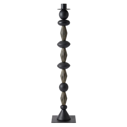 Decorative black and gold candle holder on a white background
