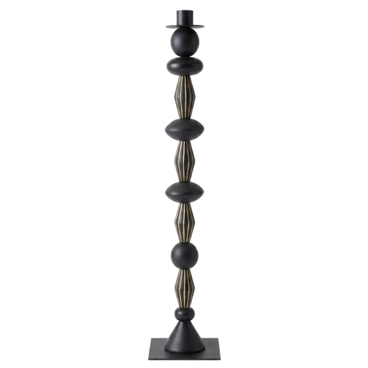 Decorative black and gold candle holder on a white background