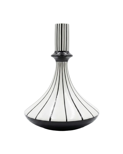 Decorative vase with black and white striped design on a white background