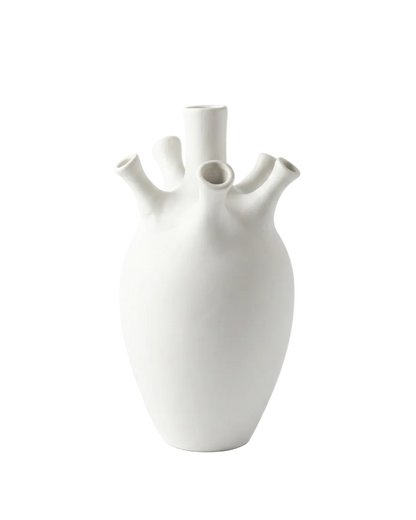 White ceramic vase with unique design on a light gray background