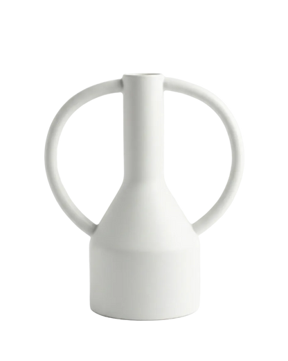 White ceramic pitcher on a light gray background