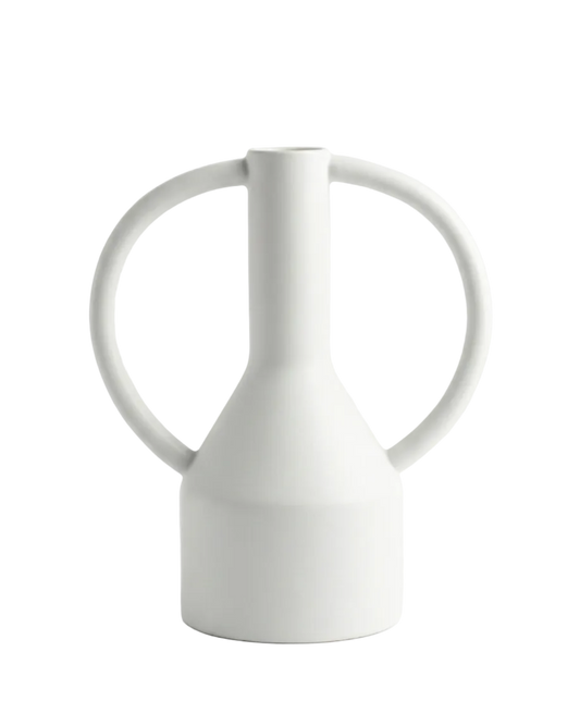 White ceramic pitcher on a light gray background