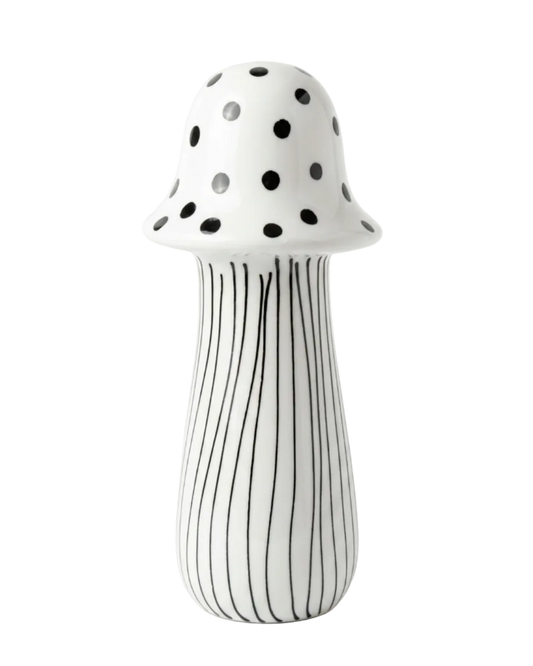 Mushroom-shaped vase with black polka dot top and striped body on a white background