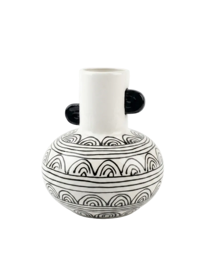White vase with black geometric patterns and handles on a white background