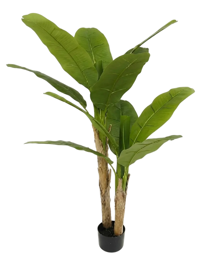 Artificial banana plant with large green leaves on a white background