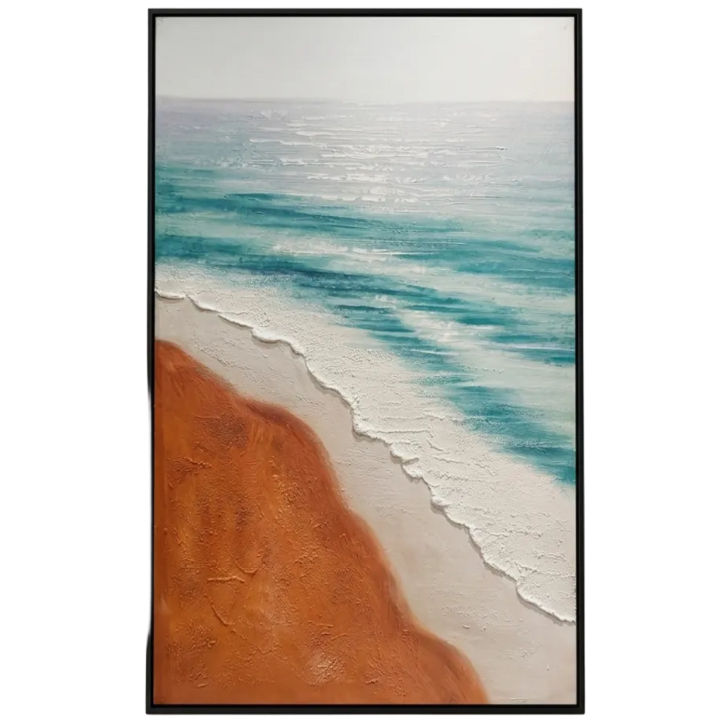 Framed artwork of a beach scene with blue water and orange sand on a white wall.