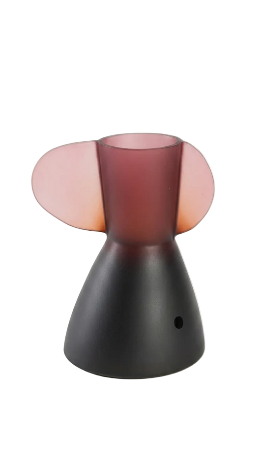 Decorative lamp with pink and black design on a white background