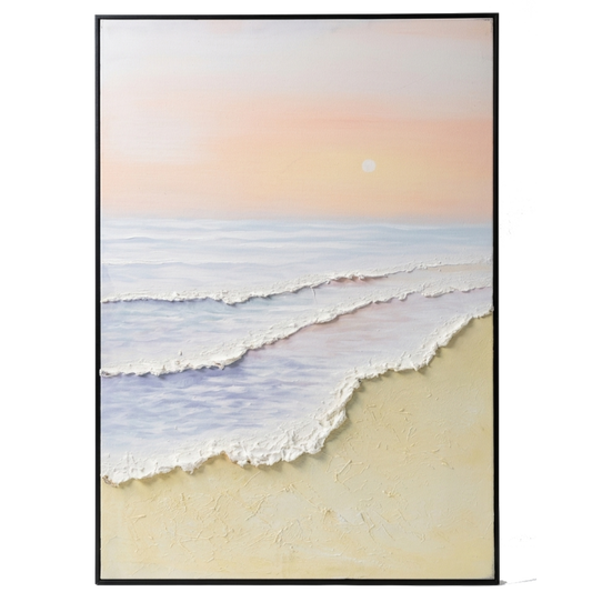 Framed artwork of a beach scene with waves and a sunset.